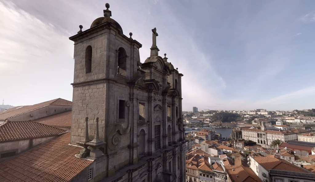 The austere façade of Igreja de São Lourenço, known as Igreja dos Grilos, with its impressive stone architecture in Porto.